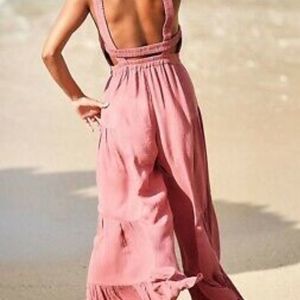 Free People Pink Jumpsuit with Open Back and Flowing Design